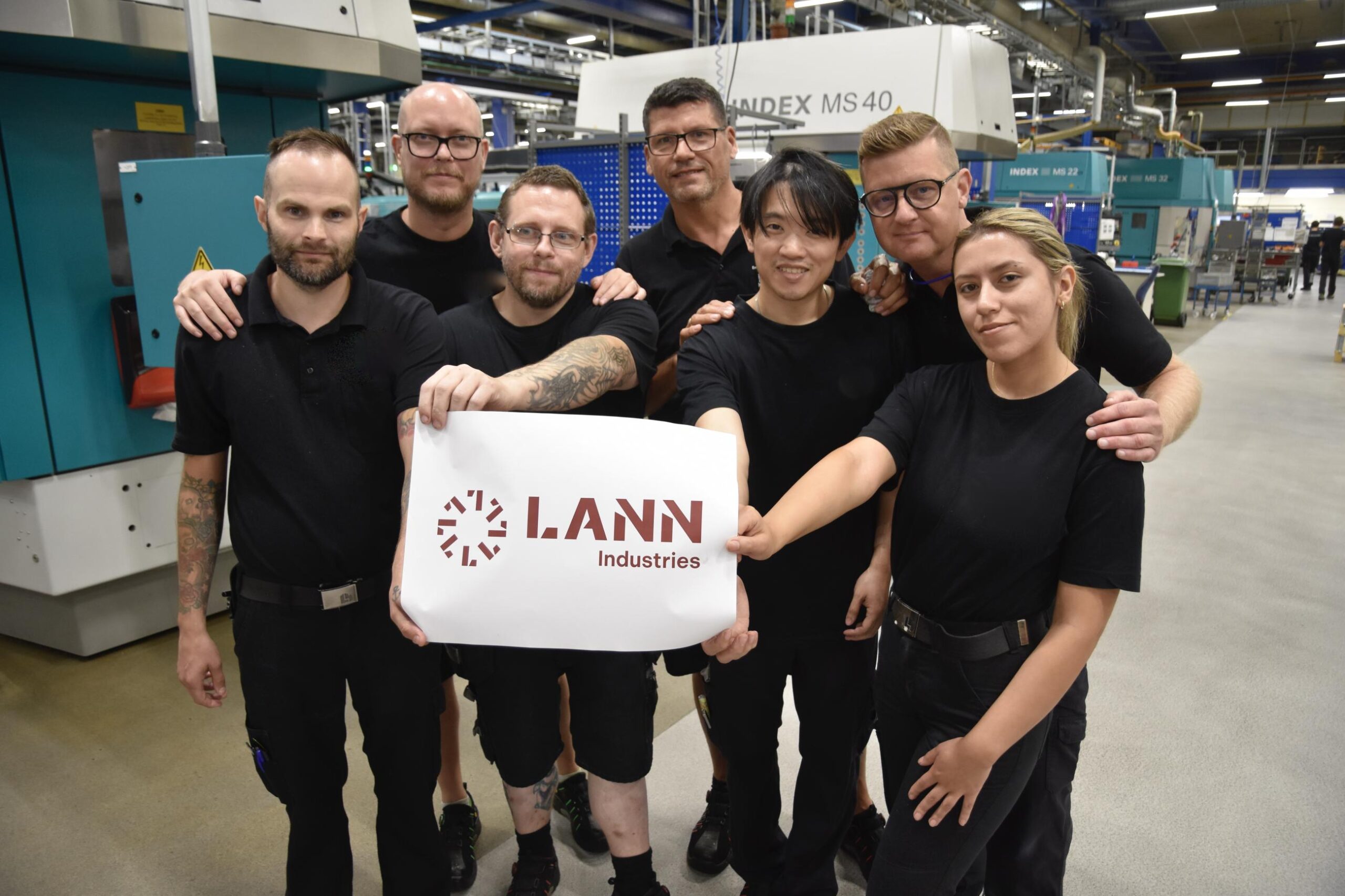 Personal från Lann Industries.